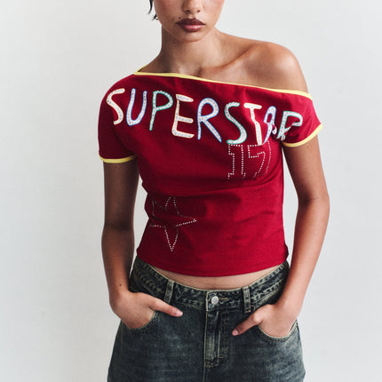 Superstar Seven Off-the-Shoulder Tee | Red | Studded Graphic | Straight Neckline
