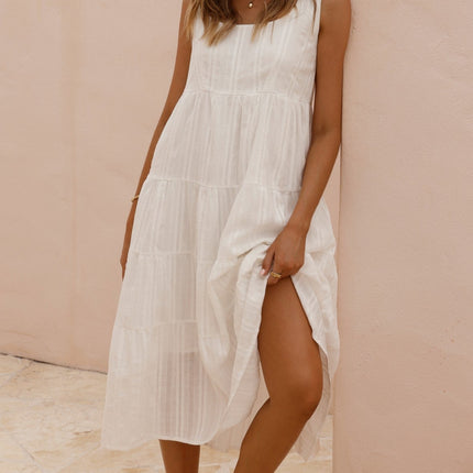 White Liza Midi Dress | Cotton Fabric | Tiered Skirt | Subtle Floral Pattern | Square Neckline | Thick Straps | Relaxed Fit | Mid-Length | Perfect for Summer and Maternity | Versatile and Comfortable