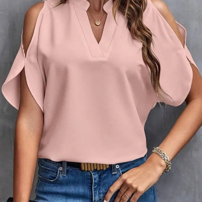 Kris - Effen blouse met inkepingen en eenvoudige elegante split mouwen - Visconte