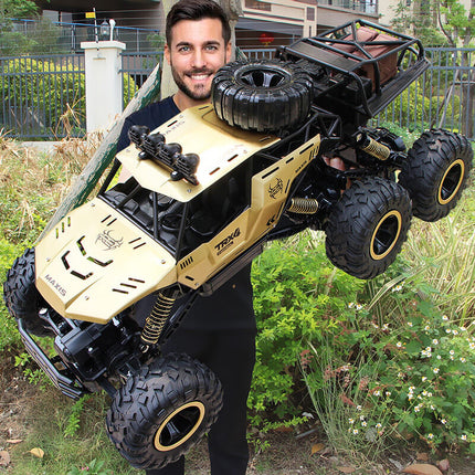 1:12 Scale 6-Wheel RC Monster Truck | Off-Road Capability | Advanced 2.4GHz Technology | Shock Absorbers | Non-Slip Tires | High Speed 52 km/h | USB Rechargeable Battery | Black & Gold Options