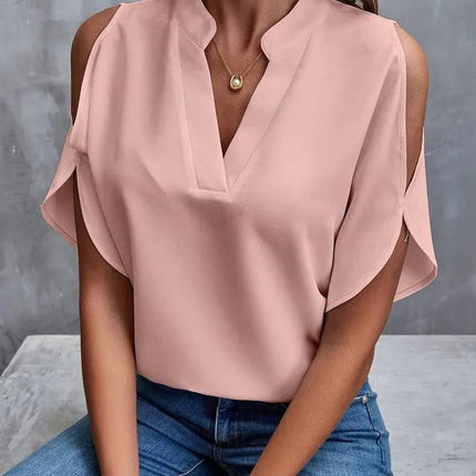 Kris - Effen blouse met inkepingen en eenvoudige elegante split mouwen - Visconte
