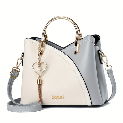 YSL Essential Luxury Leather Shoulder Bag | Vibrant Color Block Design | Stylish Tassel Accents | Spacious Interior