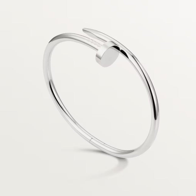 Rion Silver Bracelet | Industrial-Inspired | Sleek Polished Finish | Minimalist Design | Elegant Statement Jewelry | Durable Luxury Accessory | Versatile for Layered Look | Unique Nail Motif