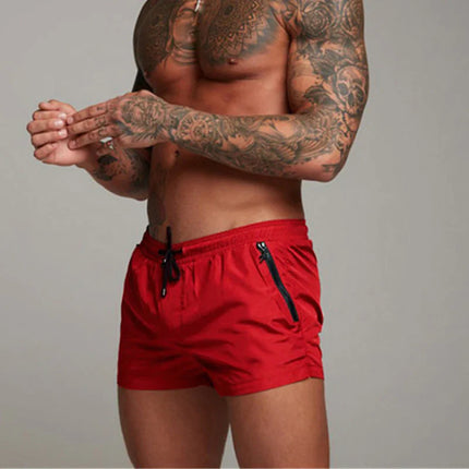 Men's Quick-Dry Beachwear Shorts | Sleek Leg-Hugging Fit | Elastic Waist | Functional Pockets | Polyester-Spandex Blend | Vibrant & Classic Colors | Ideal for Swimming & Summer Activities