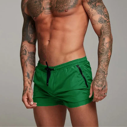 Men's Quick-Dry Beachwear Shorts | Sleek Leg-Hugging Fit | Elastic Waist | Functional Pockets | Polyester-Spandex Blend | Vibrant & Classic Colors | Ideal for Swimming & Summer Activities