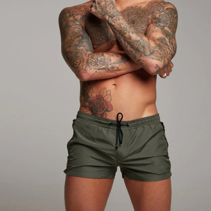 Men's Quick-Dry Beachwear Shorts | Sleek Leg-Hugging Fit | Elastic Waist | Functional Pockets | Polyester-Spandex Blend | Vibrant & Classic Colors | Ideal for Swimming & Summer Activities