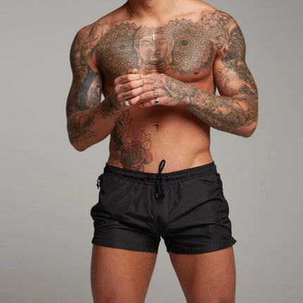 Men's Quick-Dry Beachwear Shorts | Sleek Leg-Hugging Fit | Elastic Waist | Functional Pockets | Polyester-Spandex Blend | Vibrant & Classic Colors | Ideal for Swimming & Summer Activities