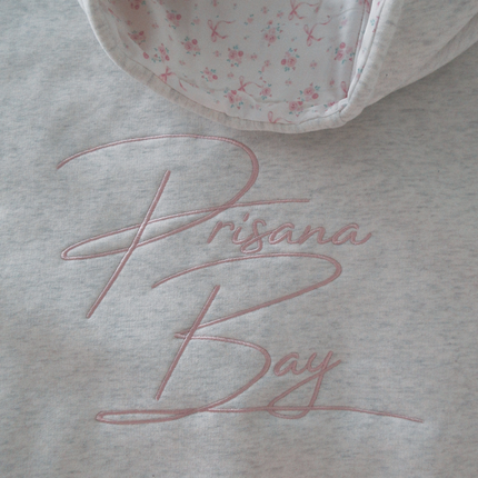 Women's Pink Hoodie | Subtle Bow Detail | Regular Fit | Soft and Durable | Adjustable Drawstring Hood | Comfortable Loose Fit | Stylish and Playful Design