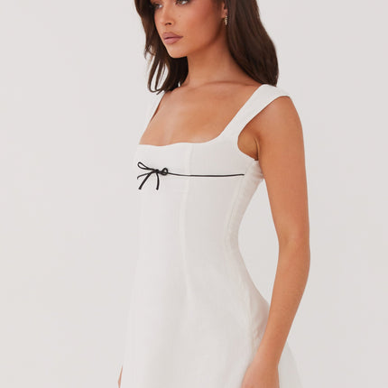 Peppermayo Exclusive | Chic White Mini Dress | Black Ribbon Detail | Square Neckline | Wide Hem & Straps | Fully Lined | Invisible Side Zipper | 100% Cotton | Elegant Look for Evening Events