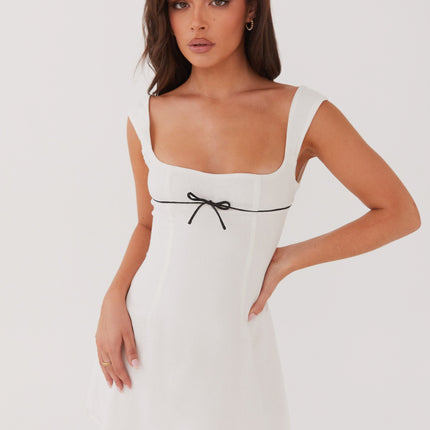 Peppermayo Exclusive | Chic White Mini Dress | Black Ribbon Detail | Square Neckline | Wide Hem & Straps | Fully Lined | Invisible Side Zipper | 100% Cotton | Elegant Look for Evening Events