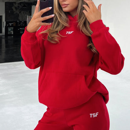 Kaztek Cozy Red Hoodie | Soft Thick Material | Warm Cuffed Sleeves & Hood | Functional Front Pocket | Embroidered TSF Logo | 60% Cotton 40% Polyester | Perfect for Winter | Women's AU 6 / US 2 Example Size