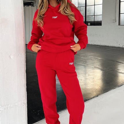 Kaztek Cozy Red Hoodie | Soft Thick Material | Warm Cuffed Sleeves & Hood | Functional Front Pocket | Embroidered TSF Logo | 60% Cotton 40% Polyester | Perfect for Winter | Women's AU 6 / US 2 Example Size