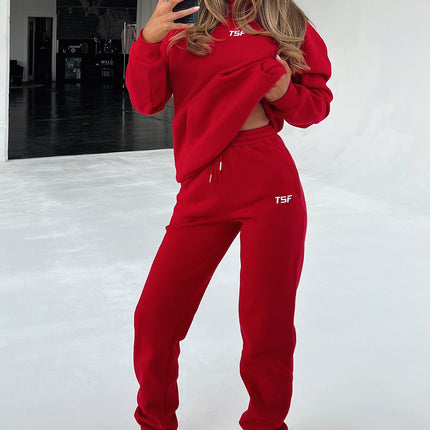 Kaztek Cozy Red Hoodie | Soft Thick Material | Warm Cuffed Sleeves & Hood | Functional Front Pocket | Embroidered TSF Logo | 60% Cotton 40% Polyester | Perfect for Winter | Women's AU 6 / US 2 Example Size
