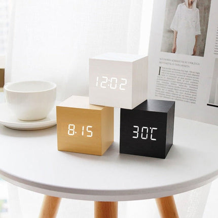 LED Cube Alarm Clock | Snooze Function | Temperature Display | 3 Display Modes | LED Light Screen | Compact Size | USB or Battery Powered | Faux Wood-Grain Finish | 4 Color Options | 6cm Dimensions