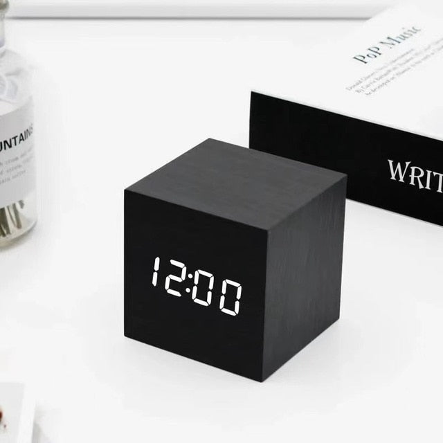 LED Cube Alarm Clock | Snooze Function | Temperature Display | 3 Display Modes | LED Light Screen | Compact Size | USB or Battery Powered | Faux Wood-Grain Finish | 4 Color Options | 6cm Dimensions