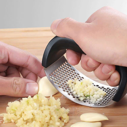 Stainless Steel Garlic Press | Effortless Garlic Crusher | Quick and Easy to Use | Dishwasher Safe Kitchen Tool | Reduces Garlic Odor on Hands | Durable and Long-Lasting Design | Essential for Cooking Prep