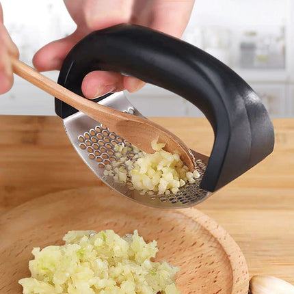 Stainless Steel Garlic Press | Effortless Garlic Crusher | Quick and Easy to Use | Dishwasher Safe Kitchen Tool | Reduces Garlic Odor on Hands | Durable and Long-Lasting Design | Essential for Cooking Prep